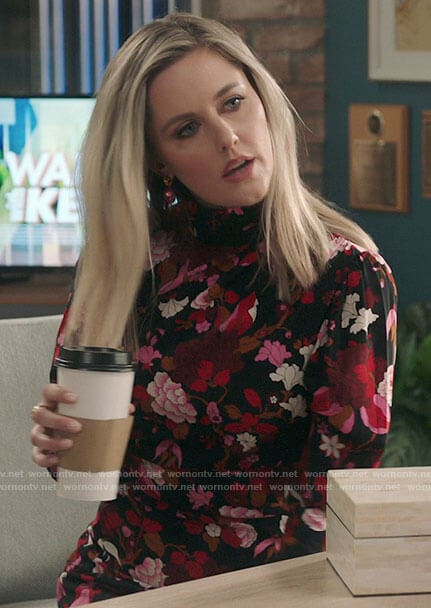 Tami’s black and pink floral long sleeve dress on Kenan