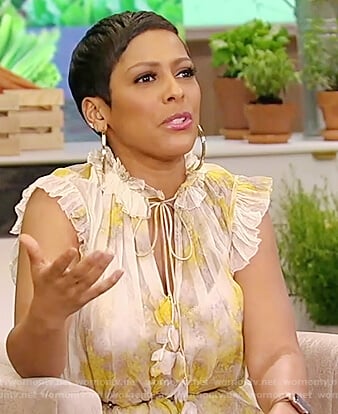 Tamron’s yellow floral ruffled dress on Tamron Hall Show