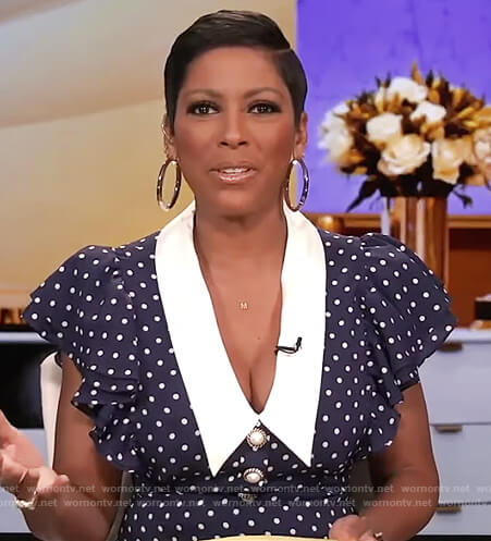 Tamron’s navy polka dot contrast dress on Tamron Hall Show