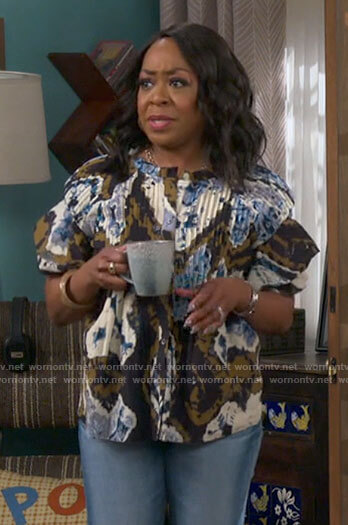 Tina’s printed button down top