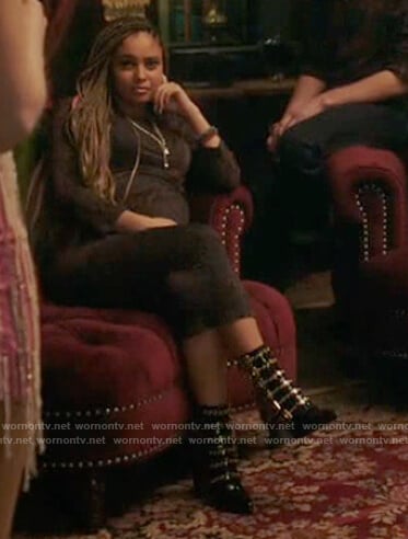 Toni’s black brass buckle boots on Riverdale