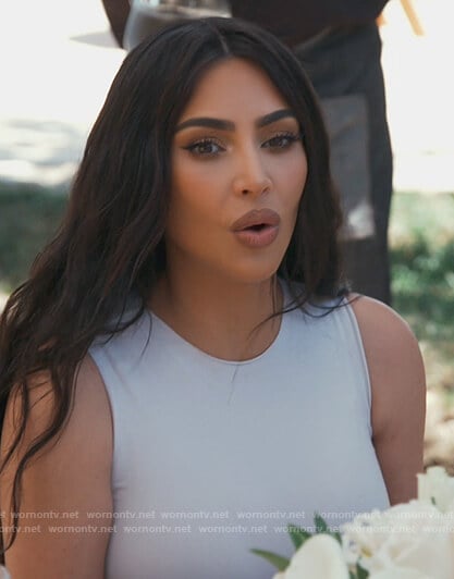 Kim’s white crew neck bodysuit on Keeping Up with the Kardashians