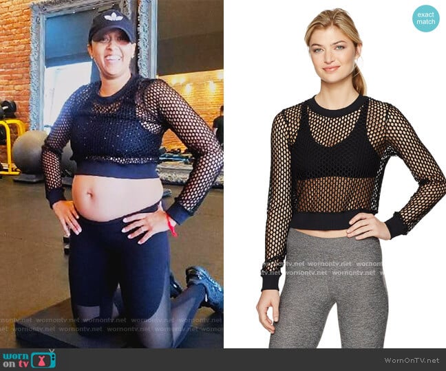 Alo Yoga Summer Time Long Sleeve Top worn by Cocoa McKellan (Tia Mowry-Hardrict) on Family Reunion