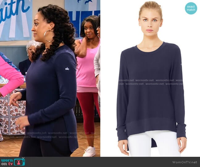 Alo Yoga Glimpse Long Sleeve Top worn by Cocoa McKellan (Tia Mowry-Hardrict) on Family Reunion