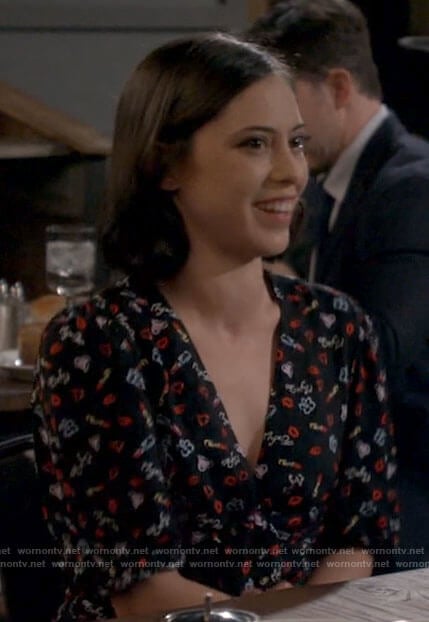 Adriana’s black printed romper on B Positive