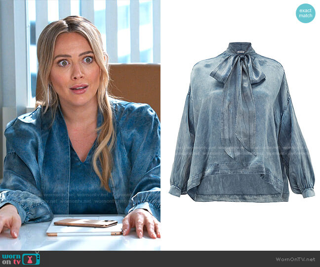 Balenciaga Pussy-Bow Satin Blouse worn by Kelsey Peters (Hilary Duff) on Younger