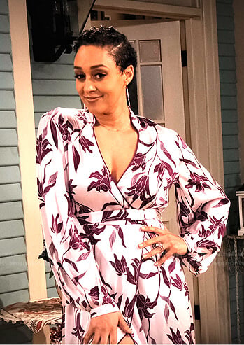 Cocoa’s pink floral wrap dress on Family Reunion
