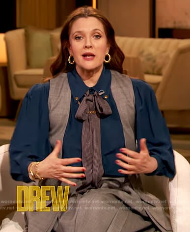 Drew’s navy blouse with chain detail on The Drew Barrymore Show