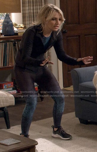 Gina’s black and blue snake print leggings on B Positive