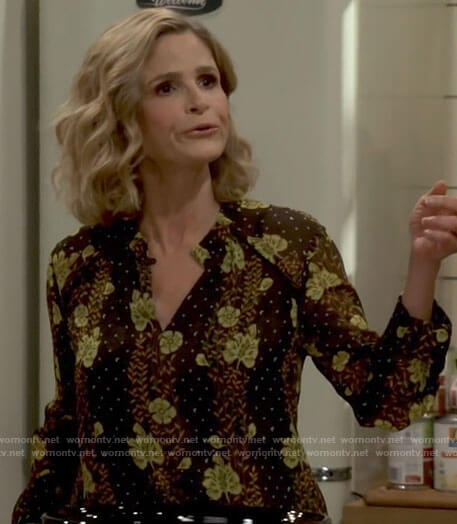 Jean’s black floral blouse on Call Your Mother