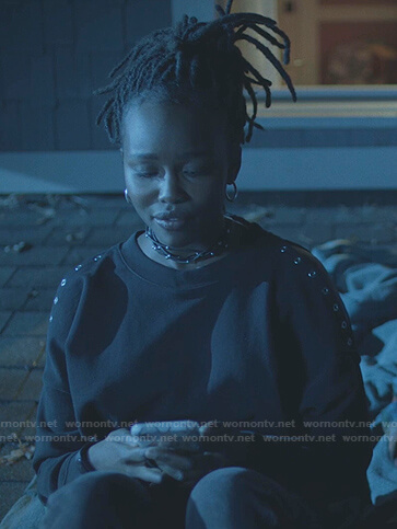 Jennifer’s black cold shoulder grommet sweatshirt on Black Lightning