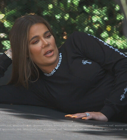 Khloe’s black cross print long sleeve tee on Keeping Up with the Kardashians