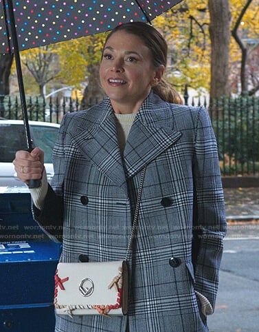 Liza’s blue plaid coat  on Younger