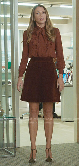 Liza’s brown ruffled blouse and velvet skirt on Younger