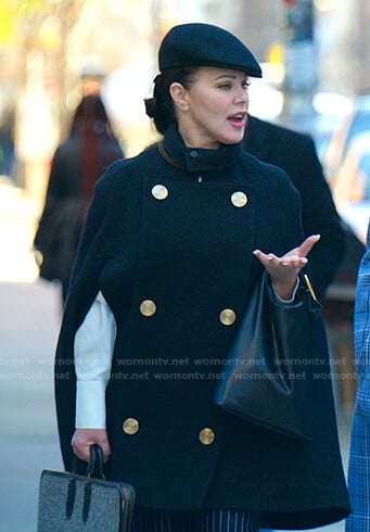 Maggie’s black double breasted cape coat on Younger
