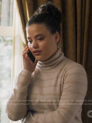 Maggie’s white striped turtleneck sweater on Charmed