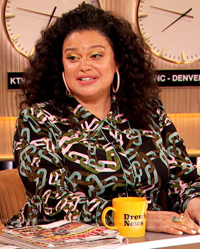 Michelle Buteau’s chain link print jumpsuit on The Drew Barrymore Show