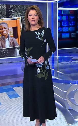 Norah’s black floral embroidered dress on CBS Evening News