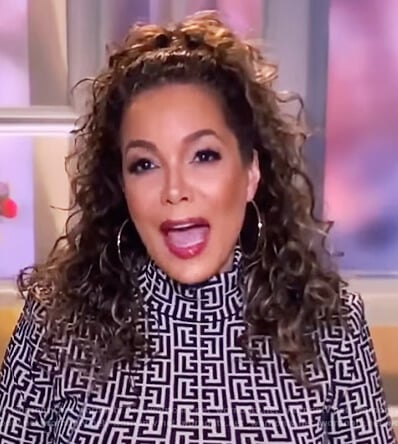Sunny’s monogram print sweater on The View