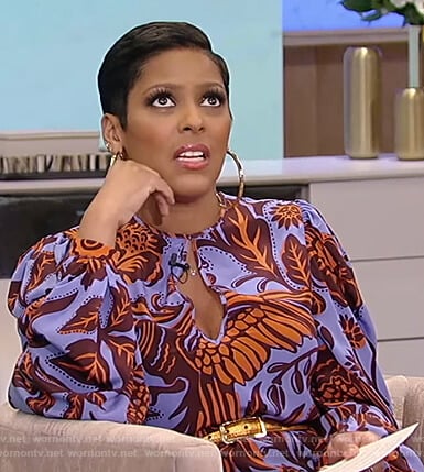 Tamron’s blue floral keyhole dress on Tamron Hall Show