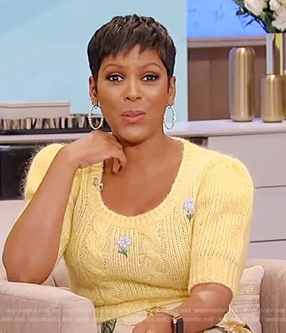 Tamron’s yellow floral embroidered sweater on Tamron Hall Show