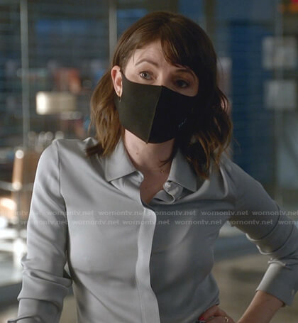 Taylor’s blue button down shirt on Bull
