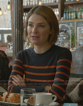 Taylor’s navy and orange striped sweater on Bull