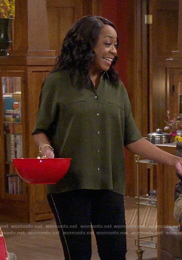 Tina’s green button down blouse on The Neighborhood