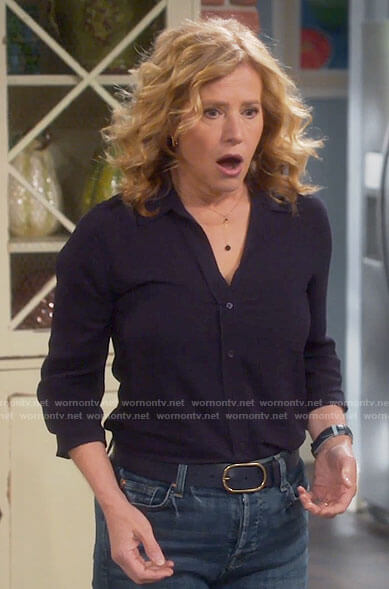Vanessa’s navy button down top on Last Man Standing