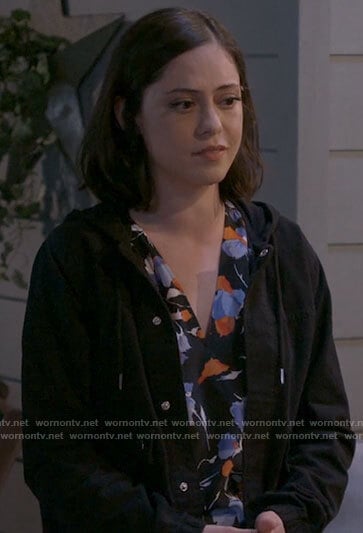 Adriana’s black, blue, and orange floral blouse on B Positive
