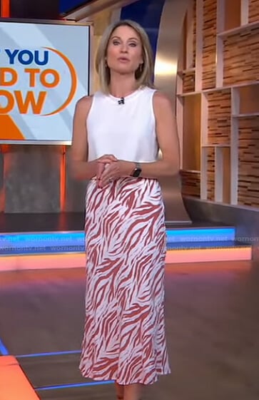 Amy’s white sleeveless top and zebra print skirt on Good Morning America