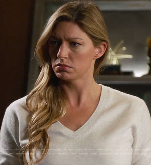 Ava’s white v-neck sweater on Legends of Tomorrow