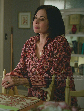 Cassie’s pink metallic printed blouse on Good Witch