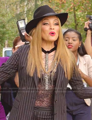 Dominique’s embellished necklace and lace top on Dynasty