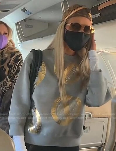 Dorit’s grey sweatshirt and sunglasses on The Real Housewives of Beverly Hills