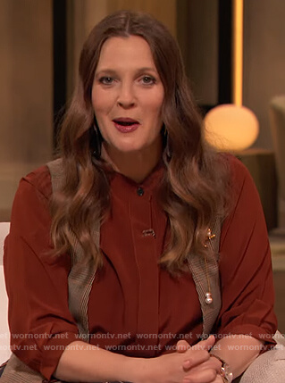 Drew’s burgundy blouse and printed skirt on The Drew Barrymore Show