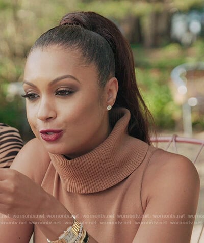 Ebony’s beige turtleneck sleeveless sweater on The Real Housewives of New York City