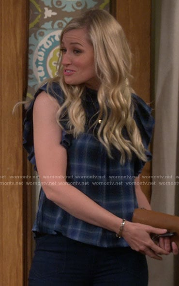 Gemma’s blue plaid ruffled top on The Neighborhood