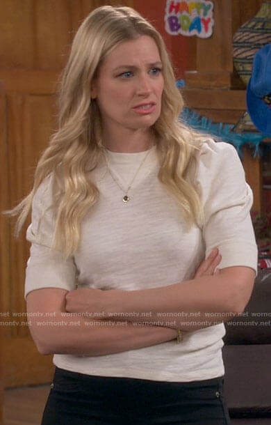 Gemma’s off-white puff sleeve top on The Neighborhood