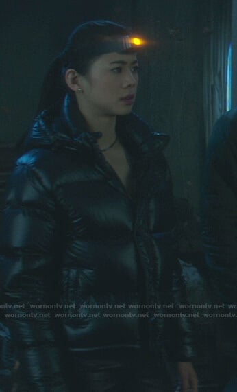 George’s black hooded puffer jacket on Nancy Drew