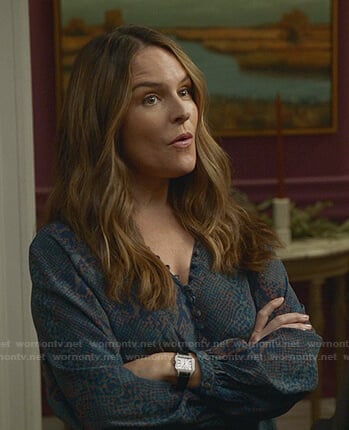 Izzy’s blue snakeskin print blouse on Bull