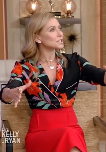 Kelly’s floral shirt and red skirt on Live with Kelly and Ryan