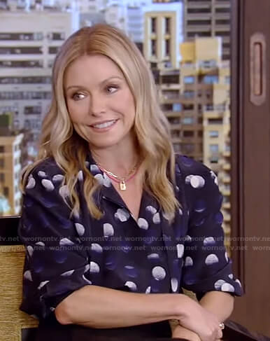 Kelly’s navy dotted tie neck blouse on Live with Kelly and Mark