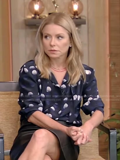 Kelly’s navy dotted tie neck blouse on Live with Kelly and Mark