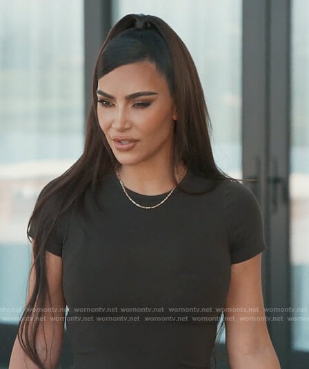 Kim’s black short sleeve top on Keeping Up with the Kardashians