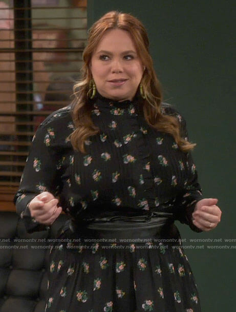 Kristin’s black floral long sleeved dress with ruffles on Last Man Standing