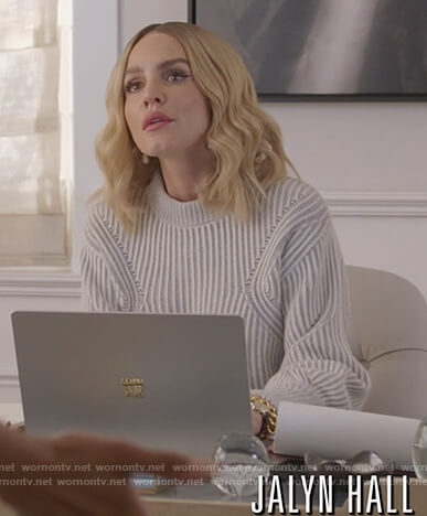 Laura’s ivory knitted sweater on All American