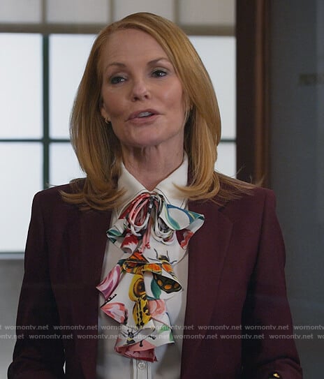 Lisa’s white contrasting stitch blouse on All Rise