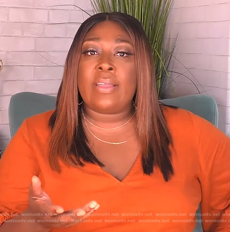Loni’s orange tie waist jumpsuit on The Real