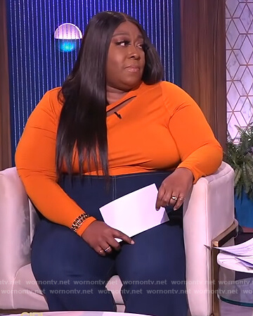 Loni’s orange cutout top on The Real